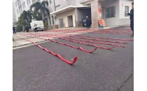 Red firecrackers ring in the new work start